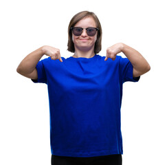 Young adult woman with down syndrome wearing sunglasses over isolated background looking confident with smile on face, pointing oneself with fingers proud and happy.