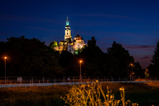 The Castle of Nitra at night from the river