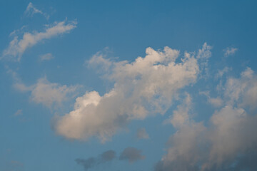 Beautiful fluffy clouds in the blue sky