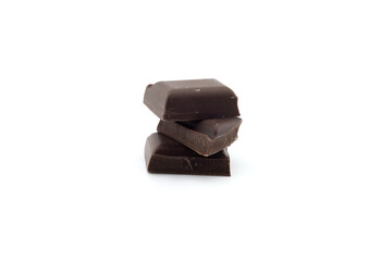 Small dark chocolate pieces isolated on white background