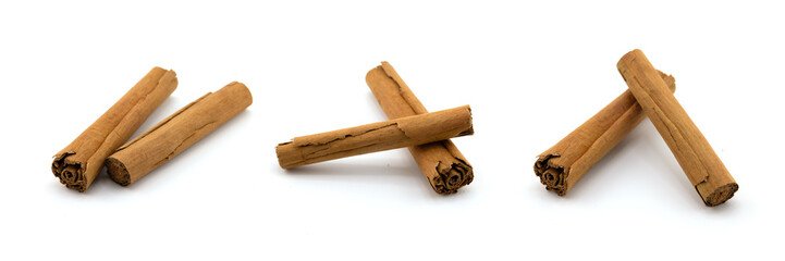 Cinnamon sticks and ground cinnamon isolated on a white background. Cinnamon spice.