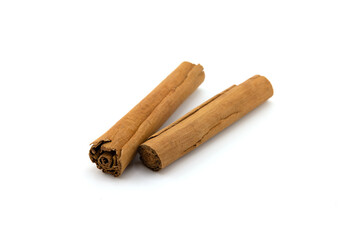 Cinnamon sticks and ground cinnamon isolated on a white background. Cinnamon spice.