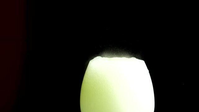 Foamy substance dissolving in water glass on bedstand fizzing poison in a glass 
