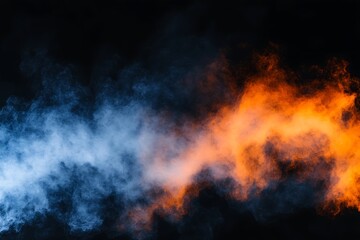 Fototapeta premium Dangerous strong flames of red-orange fire, motion clouds of black smoke covered sky. Defocus, motion blur, haze from strong fire and high temperature from flames. Atmospheric and smoke dispersion
