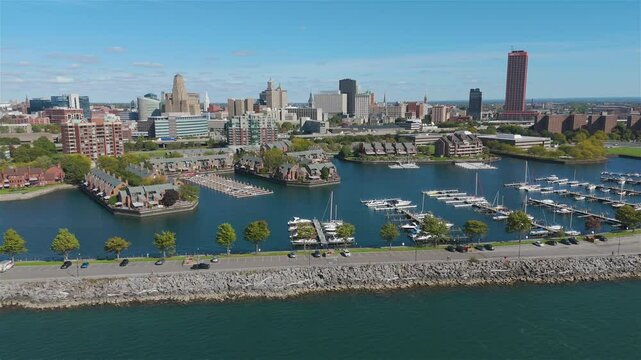 Take in the breathtaking sights of Buffalo, NY, with this stunning aerial drone footage. This clip captures a flight off of Lake Erie, soaring over the bustling waterfront and into the city skyline.