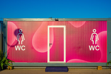 Container with adaptation for men and women s bathrooms.