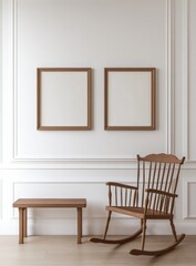 Two small wooden frames side by side on the wall of an empty nursery room, with a wooden rocking chair and bench 