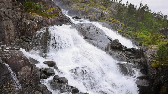 Aerial shot of Langfossen waterfall in Norway