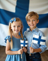 Two blond children with Finnish flags against flag of Finland.