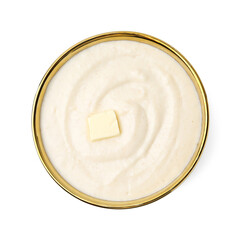 Tasty cooked semolina porridge with butter isolated on white, top view