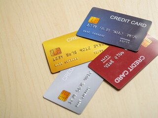 Credit card collection on wooden surface personal finance product indoor close-up money management