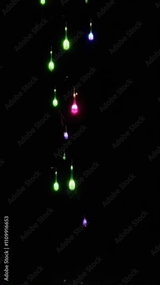 Poster futuristic droplets emitting rgb glows, descending in a dynamic motion with occasional spark collisi