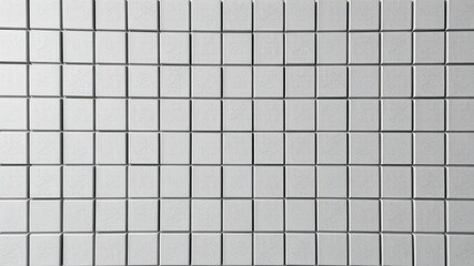 A minimalist white tiled wall with a subtle textured finish, showcasing simple elegance and geometric patterns.