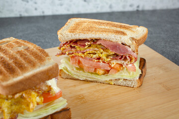 A view of a pastrami breakfast sandwich.