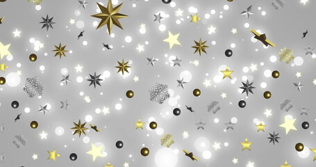 Image of stars over snow falling on grey background