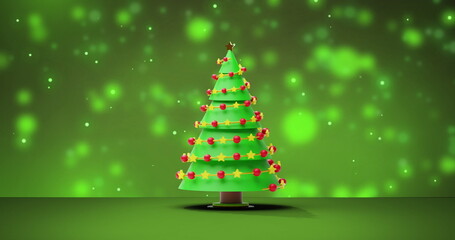 Image of christmas tree over snow falling on green background