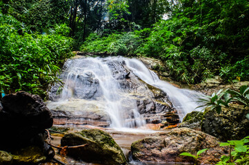 Beautiful Small Waterfall in Green Forest in jungle at Pha Lat Temple (Sakithaka),Chiang Mai, Northern Thailand