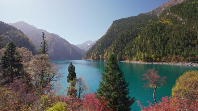 Beautiful colorful autumn leaves and nature scenic view of Long Lake in Jiuzhaigou national park