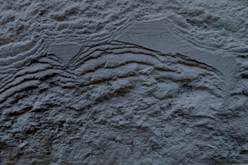 Dark gray concrete texture close-up.