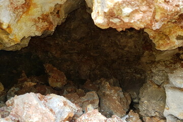 View of a karst cavity in a limestone rock formation from the inside. Lower Carboniferous, Kaluga region, Russia