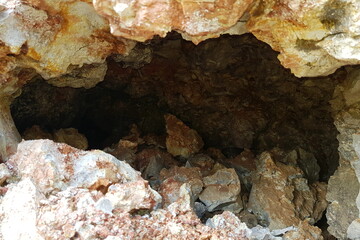 View of a karst cavity in a limestone rock formation from the inside. Lower Carboniferous, Kaluga region, Russia