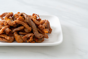 Sun-Dried Pork on white plate