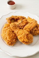 fried chicken with ketchup on plate