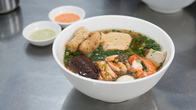 Banh Canh Cua. Vietnamese noodle with crab. Banh Canh, Vietnamese traditional soup with big rice noodles or Thick Vietnamese noodle with seafood and crab