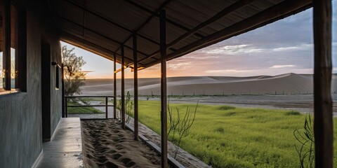 Modern Outdoor Patio with Panoramic View of Lush Green Landscape at Sunset