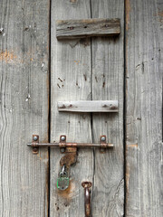 A wooden door with a lock and a keyhole spiti valley, India