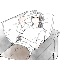 ソファーで寝ている疲れた女性