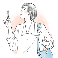 上を見て指をさすミドル女性