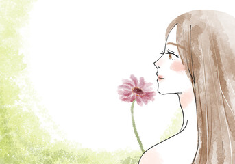 花を持った女性の横顔