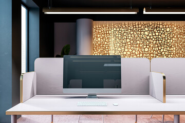 Modern office workspace with desktop computer on a stylish desk with dividers and decorative wall panels in a sophisticated interior. 3D Rendering