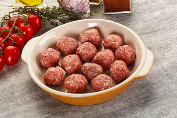 Uncooked raw beef meatball minced