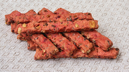 Homemade cookies with seeds and vegetables on a linen napkin