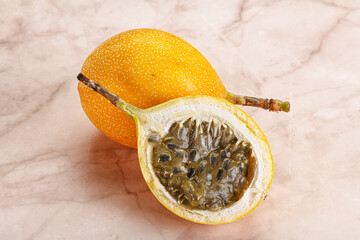 Yellow granadilla with cut half