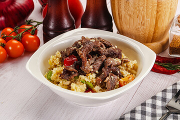 Traditional couscous with beef and vegetables