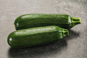 Raw green ripe zucchini vegetable