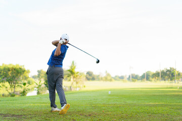 Fototapeta premium Asian man is playing golf in morning.