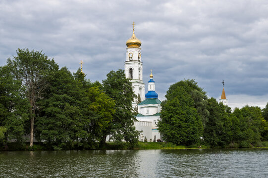 Raifa Bogoroditsky Monastery, Raifa, Republic of Tatarstan, Russia. View from Lake Raifa to the high bell tower behind the monastery wall. An ancient Orthodox monastery.