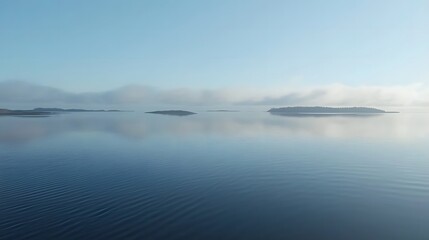 Obraz premium Baltic Sea aerial view showcasing vast expanse of water and distant coastline, symbolizing natural beauty and serene landscapes.