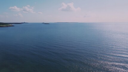 Obraz premium Baltic Sea aerial view showcasing vast expanse of water and distant coastline, symbolizing natural beauty and serene landscapes.