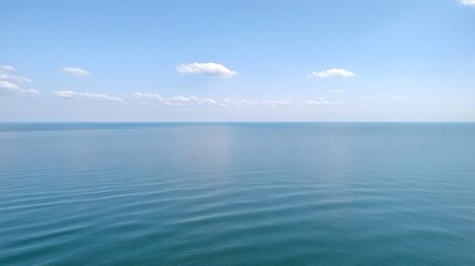 Obraz premium Baltic Sea aerial view showcasing vast expanse of water and distant coastline, symbolizing natural beauty and serene landscapes.