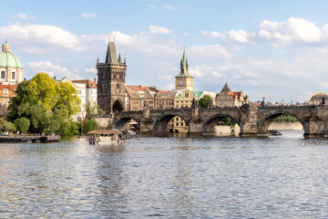 View from the embankment of the Vltava River and the Charles Bridge in Prague in the Czech Republic