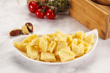 Crushed parmesan cheese in the bowl