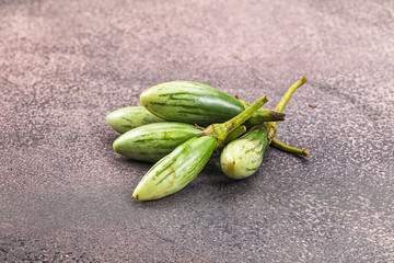 Small organic young green eggplant