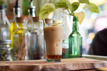 a Glass of Spices Herbal Drink Served on the Wooden Table