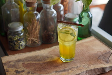 a Glass of Spices Herbal Drink Served on the Wooden Table