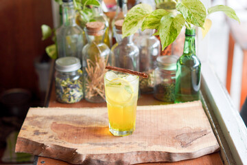 a Glass of Spices Herbal Drink Served on the Wooden Table